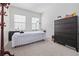 Bedroom with a massage table and dresser at 8231 Dunham Station Dr, Tampa, FL 33647