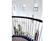 Open upper landing overlooking the grand entryway at 8231 Dunham Station Dr, Tampa, FL 33647