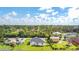 Aerial view showcasing the neighborhood and surrounding landscape at 2165 Music Ln, North Port, FL 34286