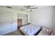 Bedroom with a double bed, dresser, and closet at 10255 Norwick St, Spring Hill, FL 34608