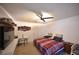 Spacious bedroom with ceiling fan and built-in shelving at 10255 Norwick St, Spring Hill, FL 34608