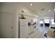 Efficient kitchen with white cabinets and appliances at 10255 Norwick St, Spring Hill, FL 34608