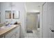 Clean bathroom with shower/tub combo and vanity at 10255 Norwick St, Spring Hill, FL 34608