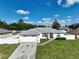 Front view of a single-story house with a garage at 10255 Norwick St, Spring Hill, FL 34608