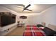 Bedroom with a ceiling fan and plenty of space at 10255 Norwick St, Spring Hill, FL 34608
