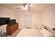 Bedroom with double bed, dresser, and TV at 10255 Norwick St, Spring Hill, FL 34608