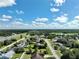 Aerial view of a residential neighborhood with houses and roads at 10255 Norwick St, Spring Hill, FL 34608