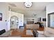 Bright dining room with view into kitchen and living room at 10255 Norwick St, Spring Hill, FL 34608