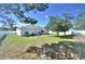 House backyard with grassy area and privacy fence at 10255 Norwick St, Spring Hill, FL 34608