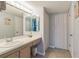 Clean bathroom with single sink vanity and shower/tub combo at 25188 Marion Ave # A103, Punta Gorda, FL 33950