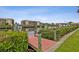 Community dock with boat slips and canal views at 25188 Marion Ave # A103, Punta Gorda, FL 33950