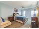 Bright bedroom with a comfortable bed, and plenty of natural light at 25188 Marion Ave # A103, Punta Gorda, FL 33950