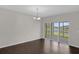 Bright dining room with sliding doors to backyard at 8064 Olive Brook Dr, Wesley Chapel, FL 33545