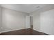 Bedroom with double door closet and dark tile flooring at 8064 Olive Brook Dr, Wesley Chapel, FL 33545