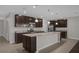 Modern kitchen with stainless steel appliances and an island at 8064 Olive Brook Dr, Wesley Chapel, FL 33545