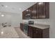 Modern kitchen with stainless steel appliances and an island at 8064 Olive Brook Dr, Wesley Chapel, FL 33545