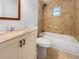 Bathroom with tub, shower, and updated vanity at 3451 Sage St, Port Charlotte, FL 33948