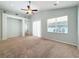 Bright bedroom with ceiling fan and carpet flooring at 423 Durham Shore Ct, Apollo Beach, FL 33572