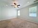 Spacious bedroom with carpeted floor and ceiling fan at 423 Durham Shore Ct, Apollo Beach, FL 33572