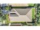 Top-down view of a single-Gathering home with a gray roof and landscaped yard at 423 Durham Shore Ct, Apollo Beach, FL 33572