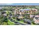 Arial view showcasing a community pool and surrounding residential area at 423 Durham Shore Ct, Apollo Beach, FL 33572