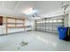 Garage with storage and a door to backyard at 423 Durham Shore Ct, Apollo Beach, FL 33572