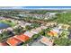 Aerial view of houses and a lake in a residential neighborhood at 423 Durham Shore Ct, Apollo Beach, FL 33572