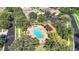 Community pool with a solar-heated patio and lounge chairs at 423 Durham Shore Ct, Apollo Beach, FL 33572