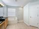 Bathroom features garden tub and a separate shower at 423 Durham Shore Ct, Apollo Beach, FL 33572