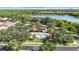 Community pool with a solar-heated patio and lounge chairs at 423 Durham Shore Ct, Apollo Beach, FL 33572