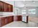 Kitchen with granite countertops and stainless steel appliances at 423 Durham Shore Ct, Apollo Beach, FL 33572