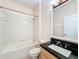 Clean bathroom with tub, shower, and granite vanity at 423 Durham Shore Ct, Apollo Beach, FL 33572