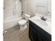 Updated bathroom with new vanity and tile shower at 4405 W Lackland Pl, Tampa, FL 33616