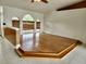 Living room with hardwood floors and raised platform at 1847 Wheeling Ave, North Port, FL 34288