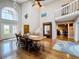 Bright dining room with hardwood floors and high ceilings at 6604 Seabird Way, Apollo Beach, FL 33572