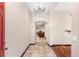 Bright entryway with tile flooring and chandelier, leading to living room at 544 Royal Ridge St, Valrico, FL 33594