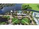 Aerial view of community with resort-style pool and lush landscaping at 1027 Signet, Apollo Beach, FL 33572