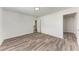 Spacious bedroom with wood-look floors and ample closet space at 822 Diane Cir, Englewood, FL 34223