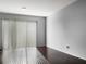 Bright living room with hardwood floors and sliding glass doors at 4916 White Sanderling Ct, Tampa, FL 33619