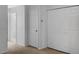Bedroom with double door closet and neutral walls at 4916 White Sanderling Ct, Tampa, FL 33619