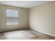Simple bedroom with neutral wall and carpeted floor at 4916 White Sanderling Ct, Tampa, FL 33619