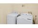 Laundry room with washer and dryer included at 10407 Villa View Cir # 10407, Tampa, FL 33647