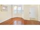 Dining area with hardwood floors and view of entryway at 10407 Villa View Cir # 10407, Tampa, FL 33647