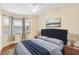 Main bedroom with hardwood floors and bay window at 10407 Villa View Cir # 10407, Tampa, FL 33647