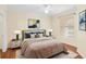 Spacious bedroom with hardwood floors, and plenty of natural light at 10407 Villa View Cir # 10407, Tampa, FL 33647