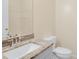 Bathroom with granite countertop and updated fixtures at 10407 Villa View Cir # 10407, Tampa, FL 33647