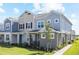 Two-story townhome with neutral siding and landscaping at 17314 Alderwood Ln, Punta Gorda, FL 33982