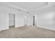 Spacious bedroom with carpeted flooring and an open view to the bathroom at 17326 Alderwood Ln, Punta Gorda, FL 33982