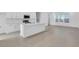 The kitchen features white cabinets, stainless steel appliances, and center island at 17326 Alderwood Ln, Punta Gorda, FL 33982