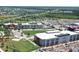 Aerial view of the school and surrounding neighborhood with well-maintained athletic fields and parking at 17326 Alderwood Ln, Punta Gorda, FL 33982